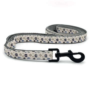a leash with natural colored paw prints of varying animals
