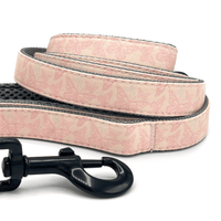a double handle dog leash in butterfly pattern