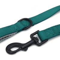 a dark teal double handle leash closeup of durable black metal clasp