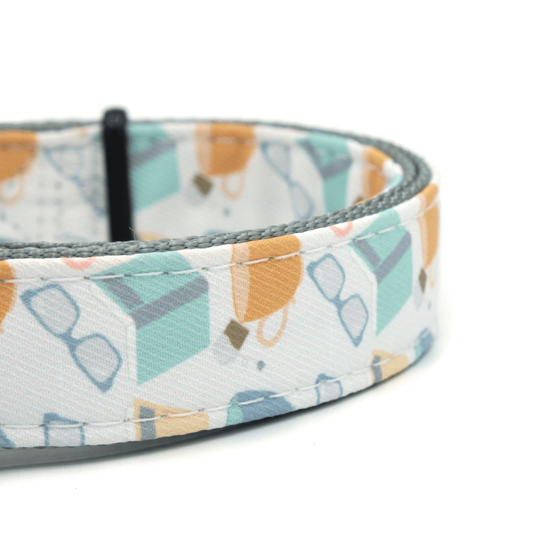 closeup of a dog collar with a reading pattern