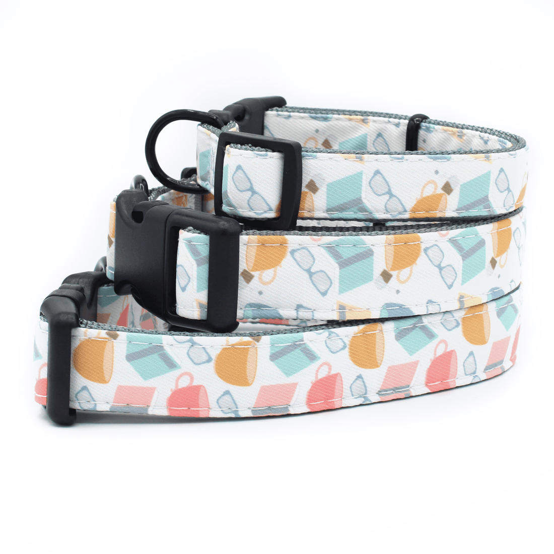 3 collars stacked on top of each other, all featuring a book themed pattern