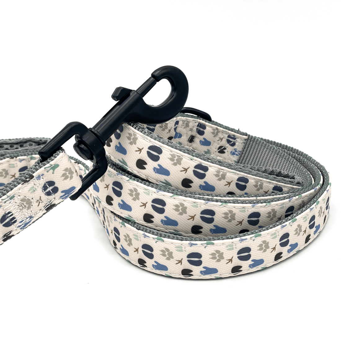 a dog leash with natural colored paw prints of varying animals