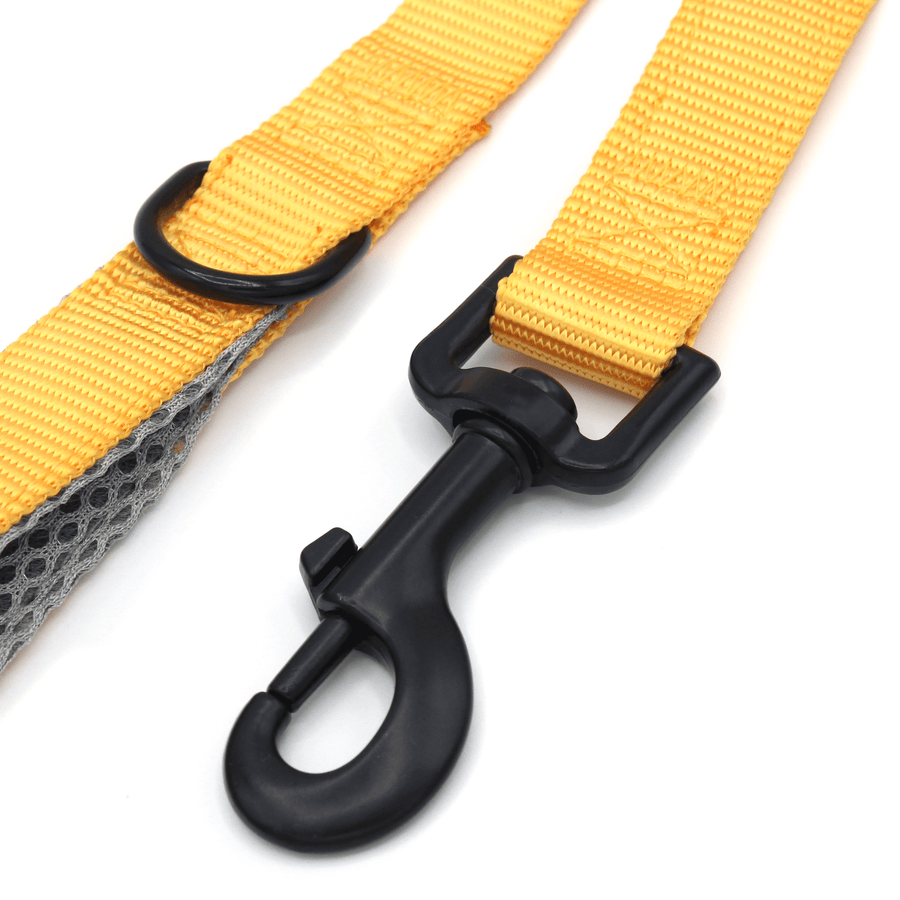 a dark yellow leash with black hardware and grey mesh handles