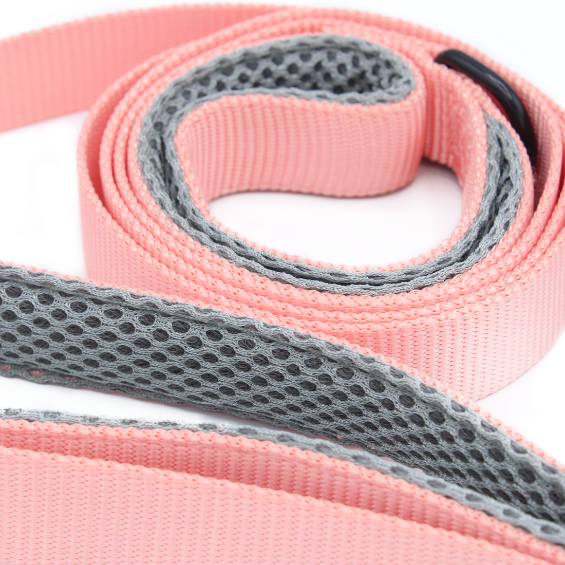 a peach colored leash with grey mesh, padded handles