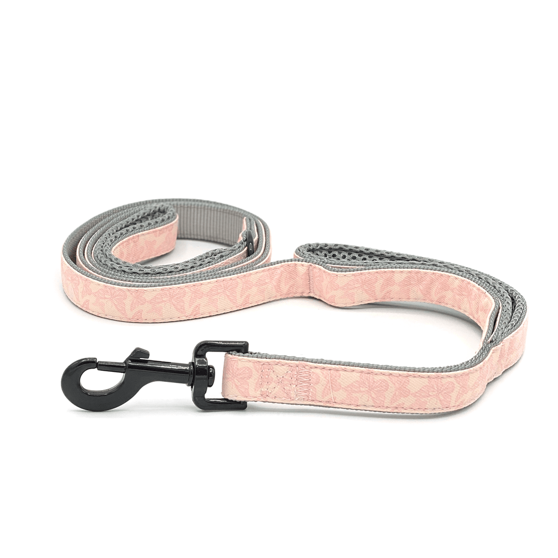 a pink butterfly patterned double handle dog leash