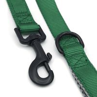 a dark green dog leash with strong clasps and padded handles
