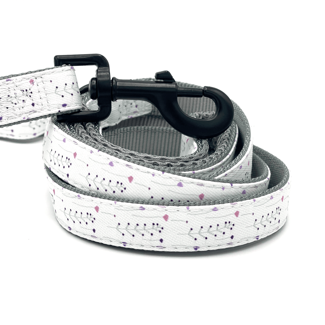 a wildflower patterned double handle dog leash for control and pulling