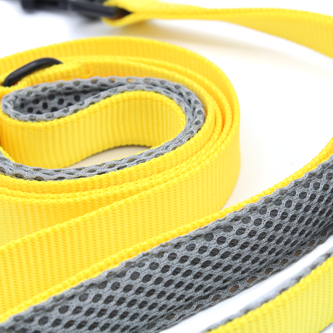 close up of padded handle on yellow double handle dog leash for comfortable grip and better control